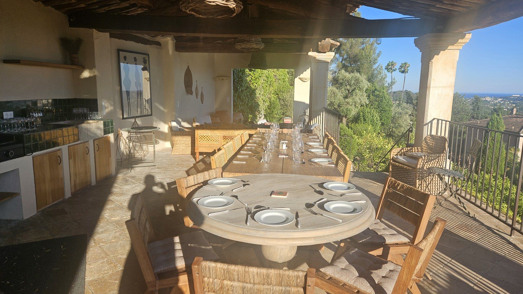 Riviera terrace dressed for a sunset dinner.
